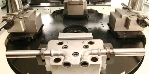 Machine for combined tube end operations